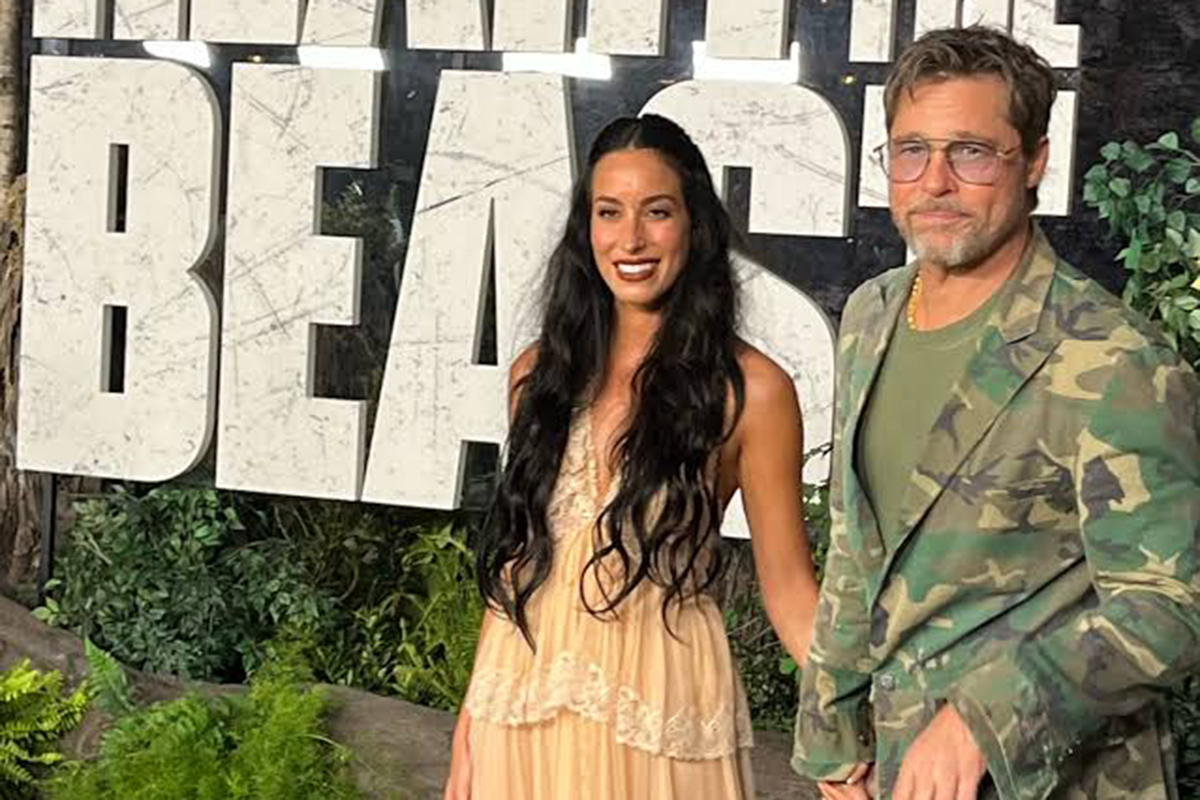 Brad Pitt in tuta mimetica alla premiere di Heart of the Beast con Ines de Ramon